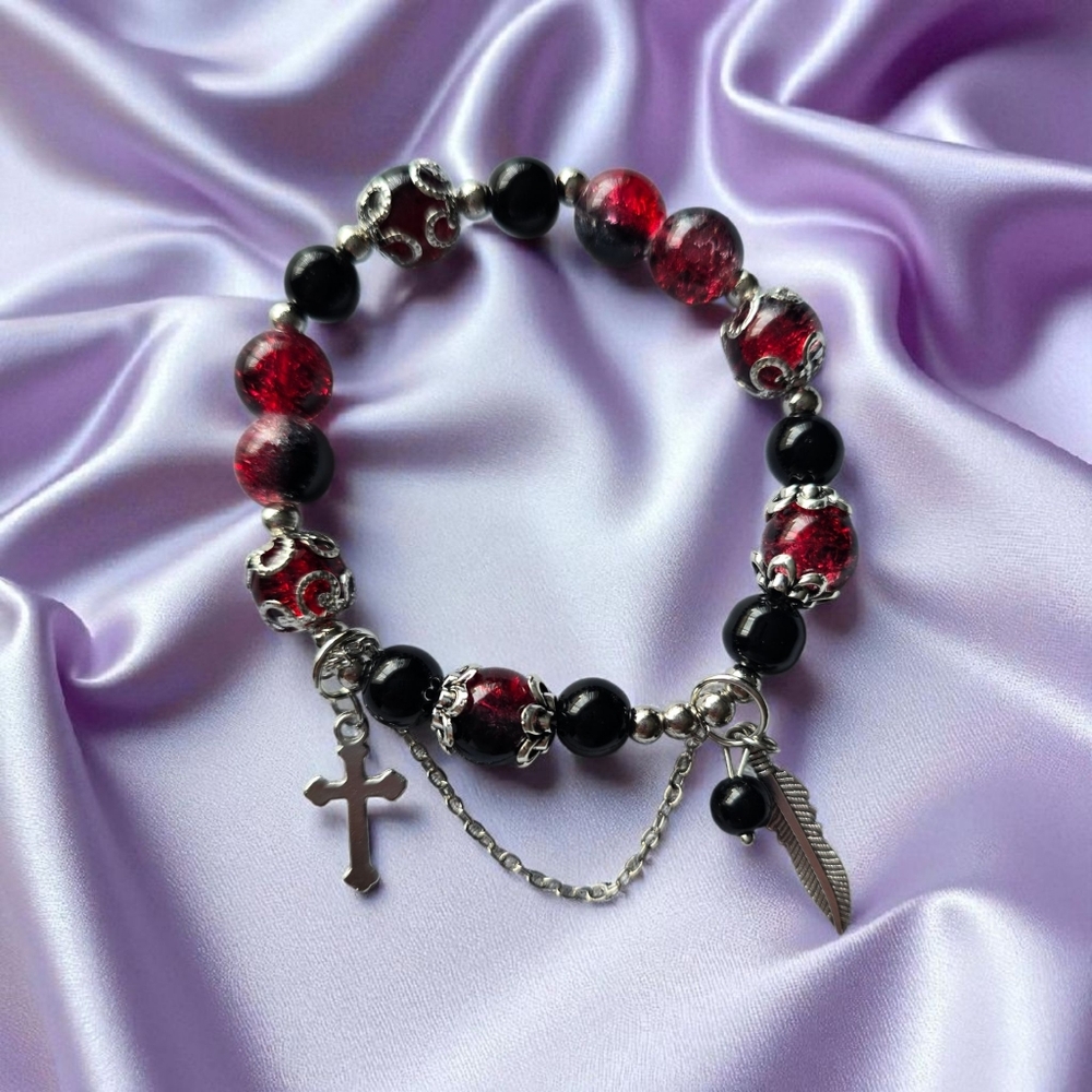 Black and Red Beaded Elastic Bracelet with Silver Charms